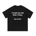 "a simple man only needs two things" Essential Cotton T-Shirt